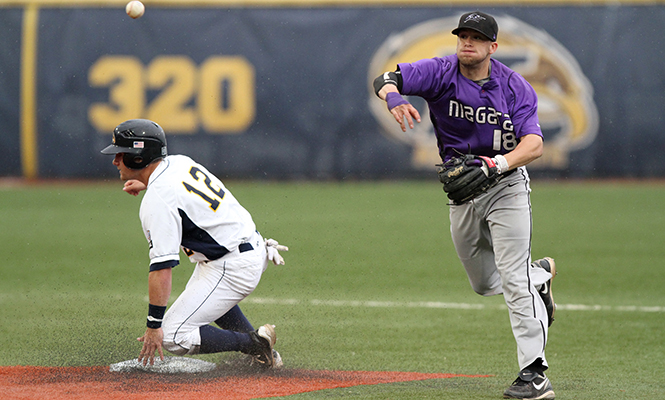 Outfielder Alex Miklos is ousted at second base by Niagara player Thomas Rodrigues at Schoonover Stadium Tuesday April 16, 2013. Kent State is competing against the College of Charleston, Univeristy of Michigan and Appalacian State Univeristy in the College of Charleston tournament starting Friday, March 14, 2014 in Charleston, SC.