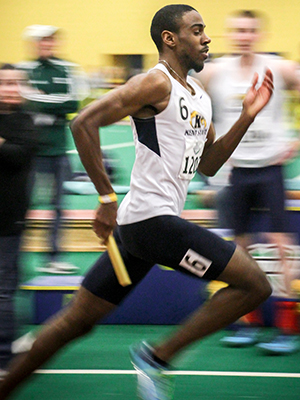 Kent State Senior Laron Brown III competes in the men's 4x400 Relay during the 2014 Indoor Track and Field MAC Championship, Sat., March 1, 2014. The men's team placed second in the MAC Championship.