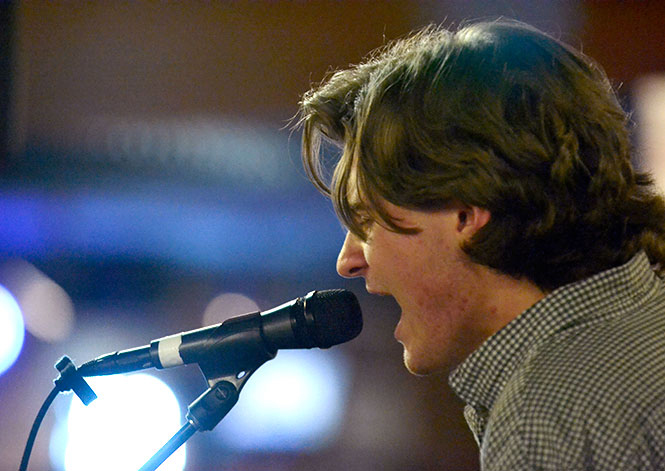 Lead guitarist and vocalist Ross Downing, and guitarist Austin Bianco play with their band Halfway Home at Quaker Steak &amp; Lube in the Rathskeller, Tuesday, March 11, 2014.