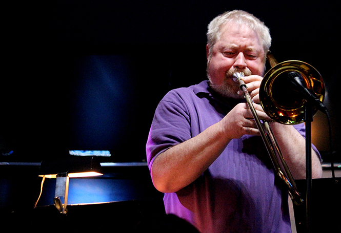 Bob Hoefler from the DanJO Jazz/Rock Orchestra plays a trombone solo at the Water Street Tavern Tuesday, April 29, 2014.