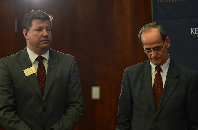 Kent State spokesman Eric Mansfield (left) and Police Chief John Peach respond to questions during a press conference on April 3, regarding the gun shot fired on Kent State University's campus Wednesday night.