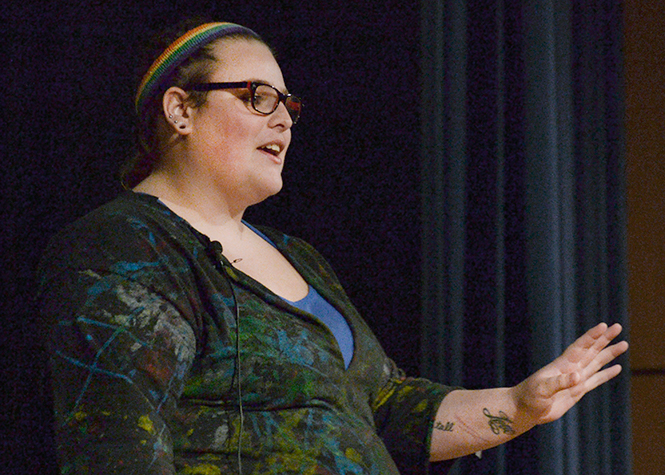 Sophomore psychology major Taylor Ault speaks at the U-Night To End Stigma event about her history with self harm and attempted suicide in the Student Center Ballroom, Monday, April 14, 2014. Ault said, "me being able to stand up here and talk about my addiction proves it is fightable."