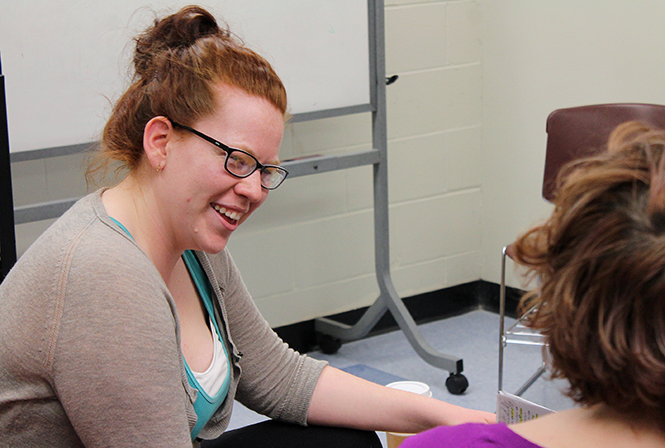 Cassandra Terry (left), rehearsing the character Grigsby, and Jessica Swank, rehearsing the character Merv relax and run through lines together in the greenroom before Our House rehearsal, Mar.10, 2014, at Kent State-Stark. The show will play April 4, 5, 11 and 12 at 8 p.m., and April 6 &amp; 13 with American Sign Language interpretation at 2:30 p.m., at the Kent State Univeristy at Stark Theatre.