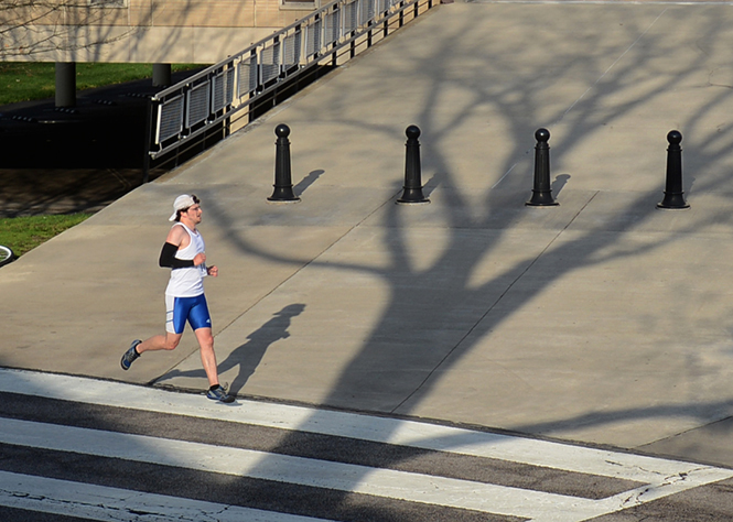 Akron resident Brian Bernard finishes The WhiteHot 5K race, sponsored by the ROTC, in first place, with a time of 18:36 on Saturday, April 26, 2014. The ROTC will sponsor an AmVets Clothes Off Your Back Race Thursday at 5 p.m. in Risman Plaza.