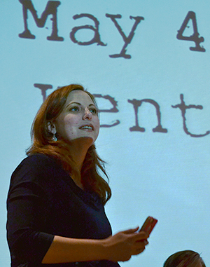 Case Western University's Shannon E. French mediates comments from the audience after the dramatic reading of the play "May 4th Voices: Kent State, 1970" in the Kiva, Wednesday, April 14, 2014. French read a CNN news update from her smartphone about 40 veterans that died in Phoenix just hours after her speech on the importance of paying attention to the needs of war veterans.