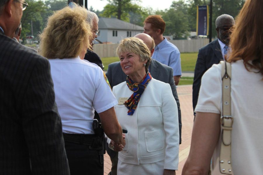 Kent State University's new President Beverly Warren shakes hands with Chief Michelle A. Lee on the Esplanade on July 1, 2014.