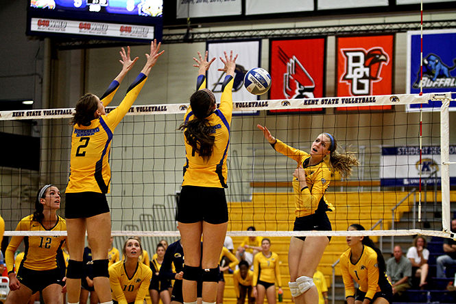 Kelsey Bittinger, outside hitter, spikes the ball earning a point for Kent State at the game against Morehead State University Friday, Sept. 5, 2014. The Flashes won 3-0.