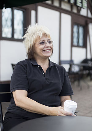 Starbucks barista Kathy Lovell has been working at Kent's Starbucks since 2006 after losing her teaching job. She is a familiar face to those who frequent the coffee shop.