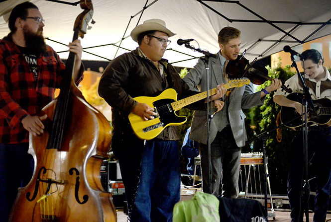 Johnny and the Apple Stompers perform in Acorn Alley Friday, Sept. 19, 2014 as part of Kent's Rountown Music Festival.