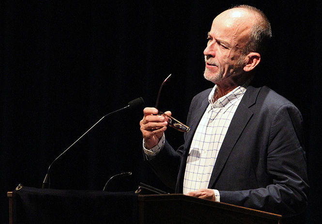 Award-winning poet Mark Doty gives a brief introduction before reciting poems as part of the 30th anniversary celebration of the Wick Poetry Center Thursday, Sept. 25, 2014 in the Kiva.