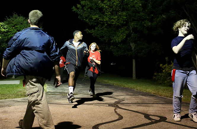 The Kent State Recreation and Wellness Center hosted Outlast the Outbreak Friday, Sept. 14, 2014 in and around the rec center. Participants were given three lives and had to outlast the zombie outbreak by running from "zombies" dressed in red.