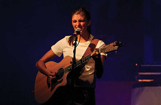 Dawn Lu / The Kent Stater Marina Strah, Senior Applied Communications major, performs at the Ohio's Got Talent competition Saturday, Sept. 13, 2014. Strah won the competition and was awarded a chance to record her first music video through Humble Heroz Productions company.