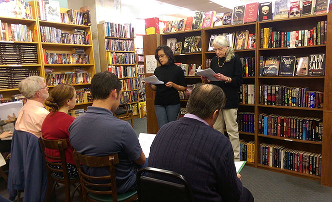 Carol Maier reads Nuria Amat's unfaithful translations of Emily Dickinson at the Last Exit Bookstore during the literary text reading Tuesday, Sept. 30, 2014 held by Kent State's translations studies program.