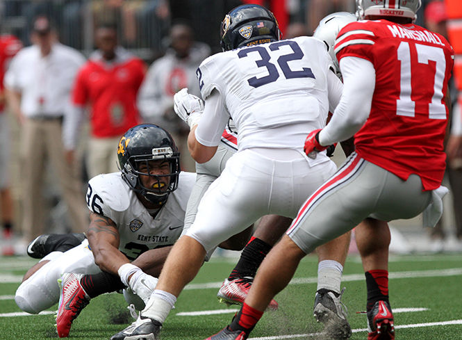 Sophomore linebacker Darius Redmond misses a near tackle at the Kent State vs Ohio State game Saturday, Sept. 13, 2014. The Flashes fell to the Buckeyes with a final score of 66-0.