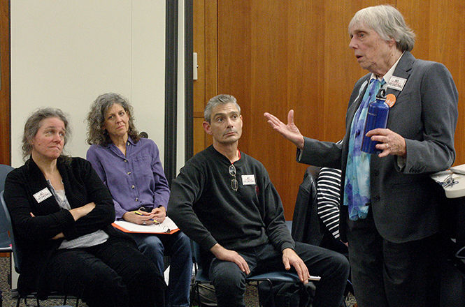 Members of the Kent Environmental Right Group, including Bonny Esparza, Kathy Schuman and Lee Brooker, attend a community event for speaker Gwen Fischer of Concerned Citizen Ohio on Sept. 15, 2014 at the Kent Free Library.