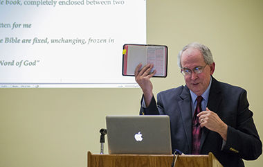 Robert Fowler, Ph.D., a Professor of Religion at Baldwin Wallace University, speaks in the Student Center on Monday, September 6, 2014 about media influence on reader's understanding of the bible throughout history. Fowler said, "Electronic media allows old media, like the bible, to exist in many new ways never thought possible."