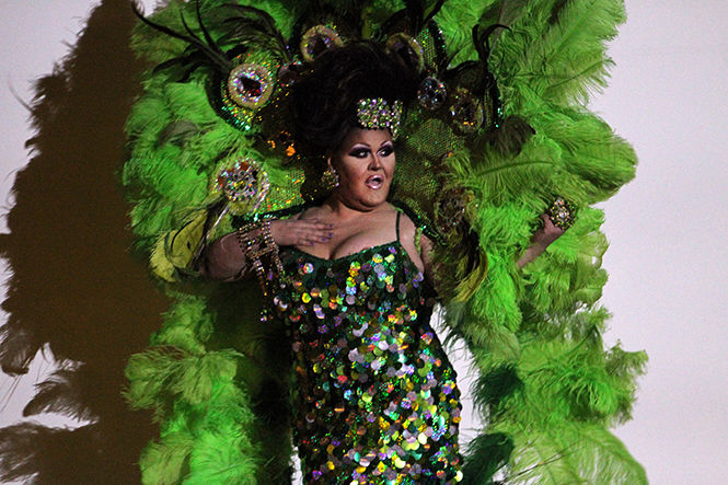 Drag queen Danyel Vasquez opens the show by lip-synching during Sex Week's Drag Show in the Cartwright Hall Auditorium on Thursday, Oct. 30, 2014.