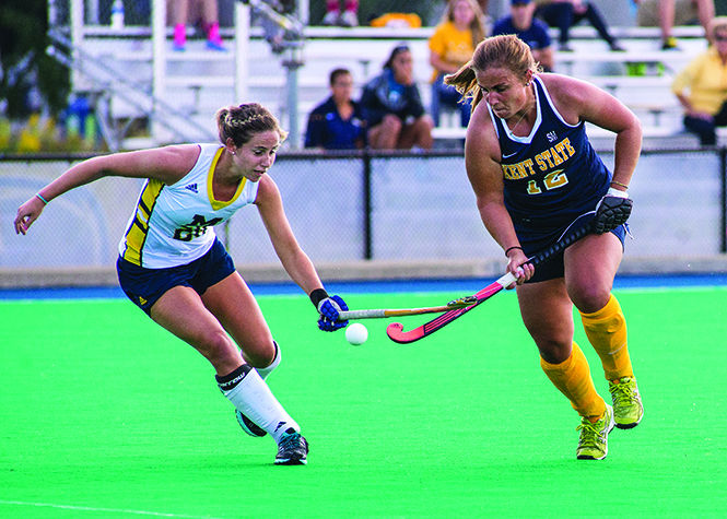 Kent State's senior midfielder Julia Hofmann fights for possession of the ball in the game against the University of Michigan Sunday, Sept 21, 2014. The Flashes lost 3-2.