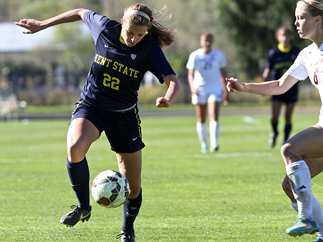 Sophomore midfielder Abbie Lawson gets the ball from a Central Michigan player at the game Sunday, Oct. 26, 2014. The Flashes lost, 0-1.