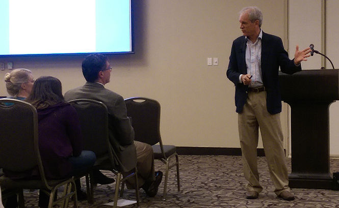 Mark McDaniel speaks to the audience at Kent State’s Science of Learning and Education, or SOLE, summit about effective teaching techniques Thursday, Oct. 9, 2014 at the Kent State Hotel and Conference Center.