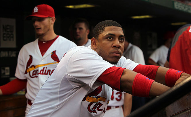 The St. Louis Cardinals' Oscar Taveras looks to the field before action against the Milwaukee Brewers on Friday, August 1, 2014, at Busch Stadium in St. Louis. (Robert Cohen/St. Louis Post-Dispatch/MCT)