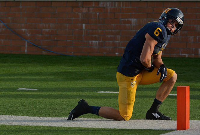 Kent State wide receiver Chris Humphrey looks up after missing the last chance for a touchdown during the game against The University of Massachusetts Saturday, Oct. 12, 2014.