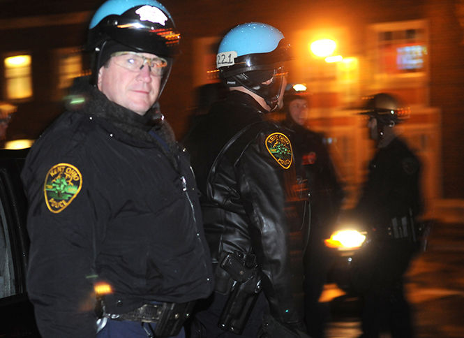 Police officers from Kent State, Kent City, and Brimfield were stationed in around Downtown Kent for the annual Halloween festivities Saturday, Oct. 26, 2013. Some officers were on duty until as early as 7 a.m. to make sure rowdy partygoers did not get out of hand.