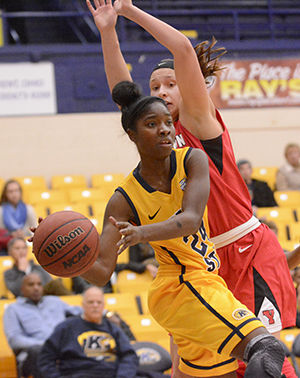 Sophomore guard Krista White struggles to pass around the heavy defense of Youngstown State during Kent State's 68-49 loss in the M.A.C. Center on Tuesday, Nov. 18, 2014.