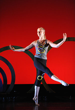 A dancer performs the choreography of Kent State’s Dance Division Director Andrea Shearer’s “To Morrow” at the dress rehearsal for Dance in Flow on Wednesday, Nov. 19, 2014. 