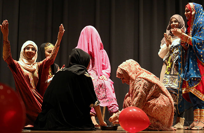 The Omani Student Organization performs an Omani wedding tradition to celebrate Oman’s National Day on Wednesday, Nov. 19, 2014.