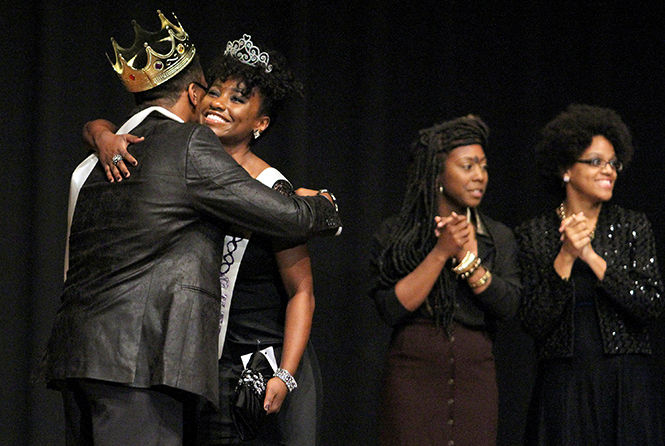 Junior Jakim Harvey embraces sophomore Kyndall Echols after they are crowned King and Queen of the 46th annual Renaissance Ball in the Ballroom Tuesday, Nov. 4, 2014.