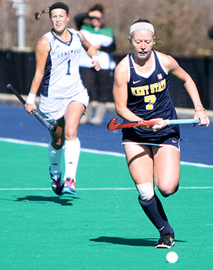 Redshirt Freshman forward Alison Harmatz sprints past Longwood's Lorissa Morton during Kent State's women's field hockey game on Sunday, Oct. 26, 2014 at Murphy-Mellis Field. The flashes held on to a one goal lead, scored in the first half by Hanna Faulkner, to win the game, improving their record to 8-8.