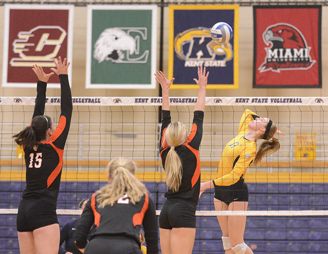 Kent State freshman outside hitter Kelsey Bittinger spikes the ball ay Bowling Green University during their final game of the regular season in the M.A.C. Center on Saturday, Nov. 15, 2014. The Flashes sent their senior class with a 3-1 win over the Falcons and will head to this weekend's MAC Tournament as the No. 7 seed with a 16-13 overall record.