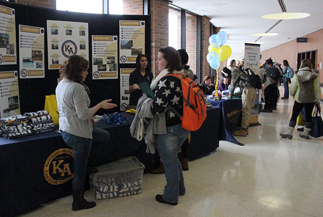 Students gather on the second floor of the Student Center for the Commuter and Off-Campus Student Organization's housing Wednesday, Nov. 19, 2014.