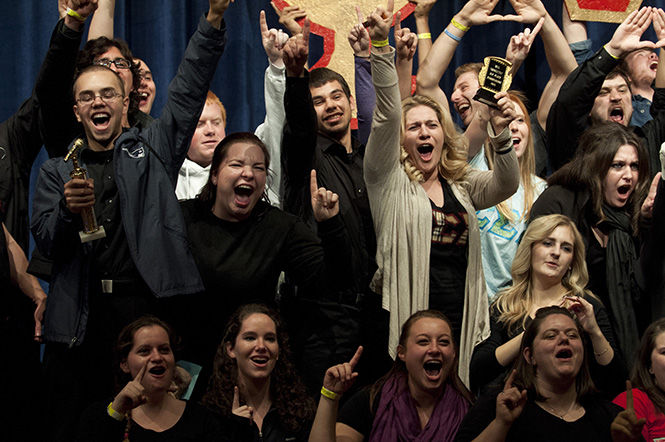 Members of Sigma Sigma Sigma, Phi Kappa Tau, Tau Kappa Epsilon and Phi lota Alpha pose for a photo after winning awards for Songfest in the ballroom Saturday, Nov. 9, 2013. Songfest consisted of team skit and dance performances and Sigma Sigma Sigma took home the first place fundraising award. The event raised money for the Rape, Abuse and Incest National Network (R.A.I.N.N.). Over $49,000 was raised for the organization.