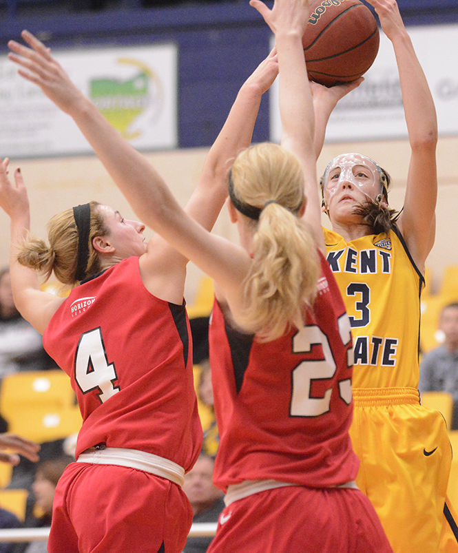 Sophomore guard Larissa Lurken goes up for a shot during Kent State's 68-49 loss against Youngstown State inside the M.A.C. Center on Tuesday, Nov. 18, 2014.