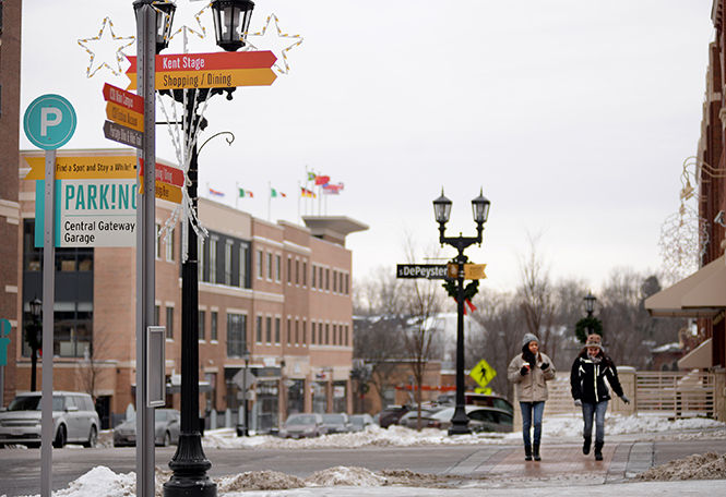  Over winter break, Downtown Kent spruced up its navigational system with newly designed road signs and street decorations.