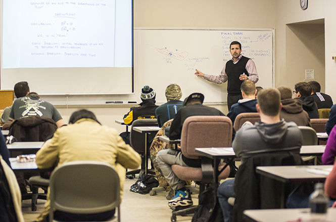 D. Blake Stringer teaches his aeronautics class Wednesday, Dec 3, 2014.