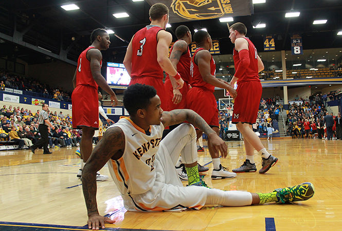 Redshirt senior Derek Jackson takes a second to recover as the Miami RedHawks get ready for another play Saturday, Feb. 7. The Flashes went on to win against Miami in the final 30 seconds of the game, 61-60.