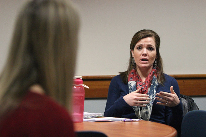 Senior clinical mental health counseling major and Army medic veteran Jessica Knicely talks about how she deals with suicidal clients at her internship at a Peer Mental Suicide Training session on the third floor of the Student Center on Friday Feb. 6, 2015.