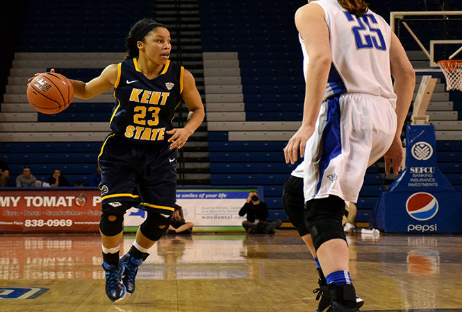 Kent State Flashes' senior guard Mikell Chinn heads off against Buffalo Bulls junior forward Kristen Sharkey. The Flashes lost 59-57.