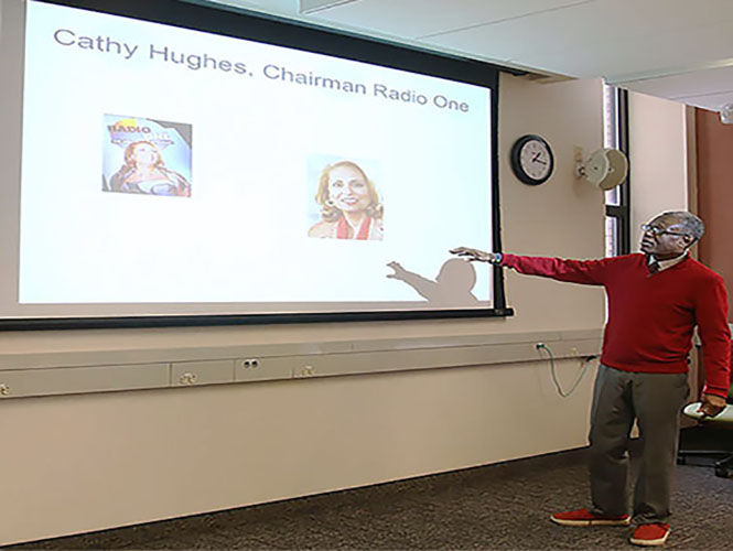 Eugene Shelton, associate professor of journalism and mass communication, teaches his African-American Media class. 