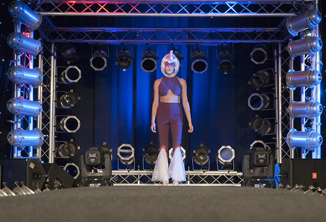 A model prepares to walk at 2012's Rock The Runway, Celestial Space Odyssey, on March 10, 2012. This year's Rock The Runway will be "Hip-Hop House Party" themed, this Saturday, March 9 in the student center ballroom from 8:00-11:00 p.m. Photo by Philip Botta.