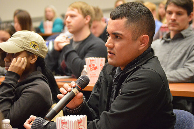 Angelo Angel, a sophomore magazine journalism major, answers Thor Wasbotten’s question of why he wants to go into journalism. “A sense of adventure, honestly,” said Angel. The school of Journalism and Mass Communication hosted “Media at the Movies” and showed “A Fragile Trust: Plagiarism, Power and Jayson Blair at the New York Times” in the First Energy Auditorium on Tuesday, March 10, 2015.