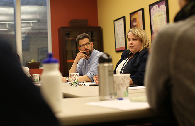 Mindy Farmer, director of the May 4 Visitors Center, speaks to participants in a workshop about overcoming trauma through creative writing. The event was held at the Wick Poetry Center on April 6, 2015.