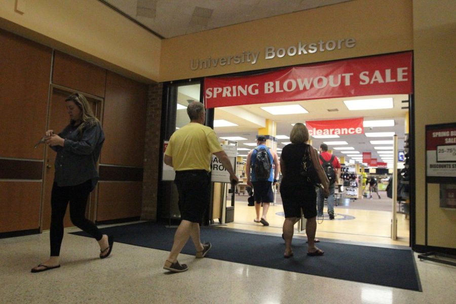 People gather in the University Bookstore in the Student Center for their "Spring Blowout Sale" on Wednesday, May 6, 2015. The bookstore closed Saturday, May 9, and will reopen Monday, May 18.