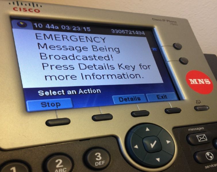 Phones throughout Kent State's campus will be enabled to display text alerts on their screens during campus emergencies. Phones with this capability will be labeled with a red sticker that says "MNS," which stands for Mass Notification System.