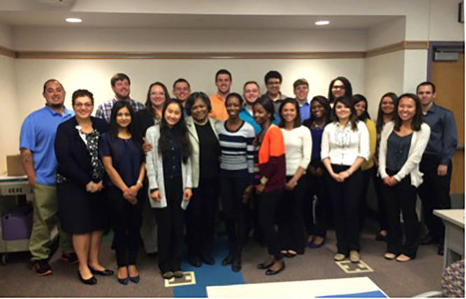 Barbara Broome (front row, fourth from left), dean of Kent State University’s College of Nursing, and Lisa Aurilio (second from left), vice president of Patient Services and chief nursing officer at Akron Children’s Hospital, met with the first 20 nursing students chosen to enter the ASCEND program. Six of these students are in Kent State College of Nursing.