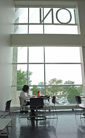 Christine Bruno, a former Kent State student who graduated with a Bachelor of Arts degree, prepares for an interview with CFDA, Council of Fashion Designers of America, in Rockwell Hall on June 25, 2015.