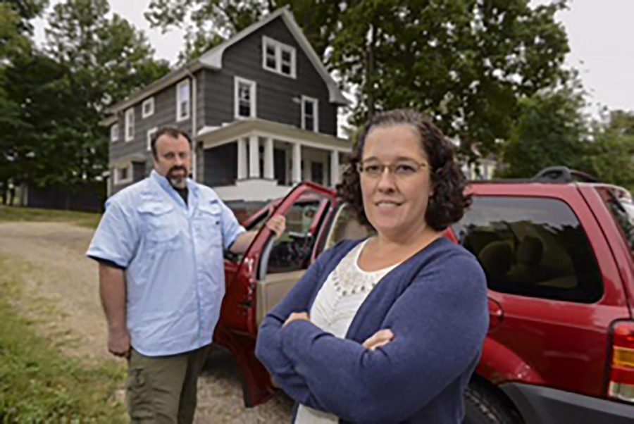 Laura Schuch is a PhD candidate in geography researching the prevalence and distribution of lead paint in older structures in Akron neighborhoods. With her is Professor of Geography Andrew Curtis.